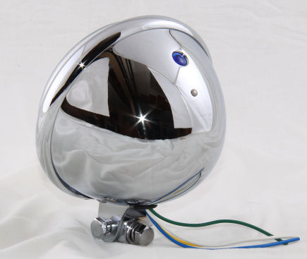 Bates style bottom mounted headlight comes with a 12 volt 55/60 watt H4 bulb and mounting block.