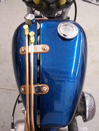 A functional tank set that carries enough fuel to give you some saddle time between gas stops, while keeping the traditional chopper gas tank proportions.