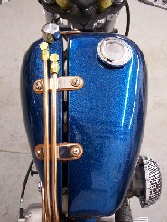 Custom split gas and oil tank sets, only from DeVille Cycles.
