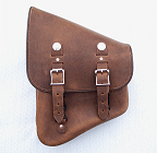 Stash Bag swingarm saddlebags from DeVille Cycles are avaiable in distressed brown or black.