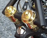 Solid brass risers for glide style Harley and aftermarket trees.
