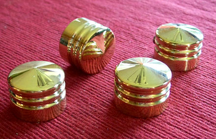 DeVille head bolt covers are machined from solid brass. They fit Evo Sportsters, Evo Big Twin and Twin Cam Harley head bolts.