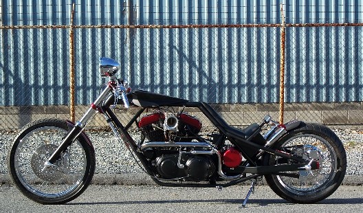 Air shifted up and down, controlled by thumb switches on handlebars.