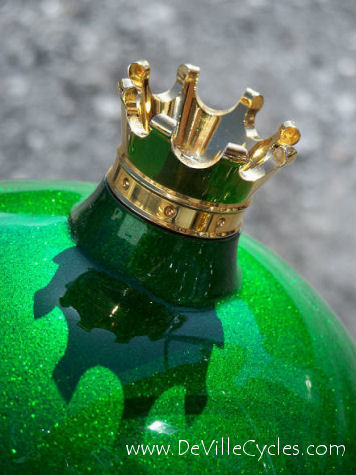 A modified DeVille Cycles Alien gas tank on this Triumph with a custom fitted 24K gold crown filler.